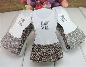 Show details for compressed t shirt Picture of compressed t shirt